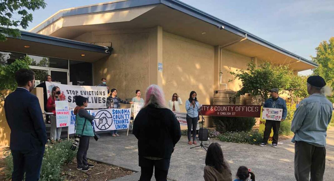 Will Carruthers ATTENTION Petaluma tenants and their supporters gathered in front of Petaluma City Hall on May 2 to advocate for additional protections for renters.