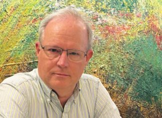 Author Michael Bourne's new novel, We Bring You an Hour of Darkness, is an eco-thriller set in a the newsroom of a daily newspaper.