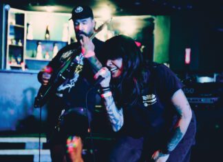 Fear Not: Day-Long Punk and Metal Fest Returns Two musicians performing on stage at a punk and metal music festival