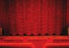 A closed red theater curtain