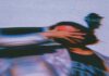 Reality Distortion Field—How and When to Use It Distorted photo of a woman holding her hand across her face