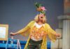 Lori Haley Fox onstage in costume during a performance of 'Mamma Mia1'
