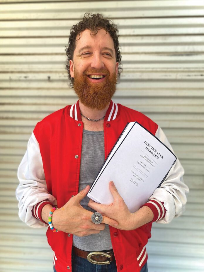 Cincinnatus Hibbard wearing a red and white jacket
