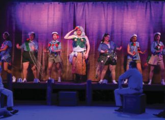 Cast members perform in 6th Street Playhouse’s South Pacific,