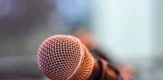A microphone on a small stand.